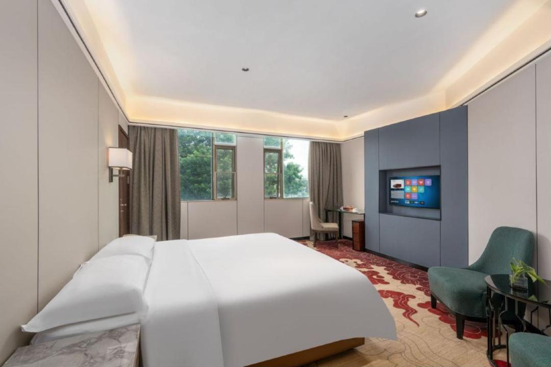Mizparton Hotel South Qianjin Road Heshan  Exterior foto